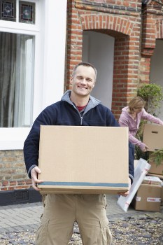 Professional removal team loading boxes in Bromley