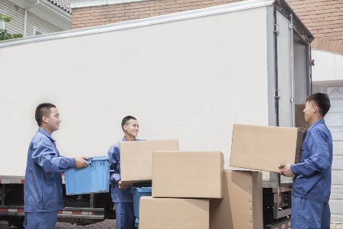 Professional man and van transporting furniture in Bromley