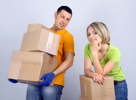 Mover using careful handling techniques during a house move