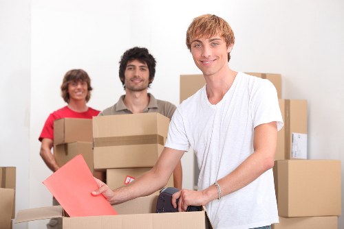 Careful loading of student belongings for a move in Bromley